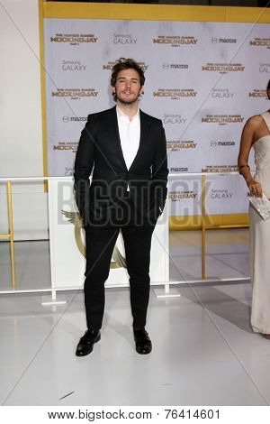 m LOS ANGELES - NOV 17:  Sam Claflin at the The Hunger Games: Mockingjay Part 1 Premiere at the Nokia Theater on November 17, 2014 in Los Angeles, CA