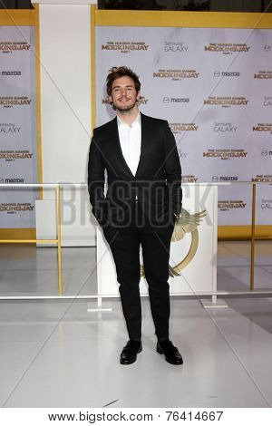 m LOS ANGELES - NOV 17:  Sam Claflin at the The Hunger Games: Mockingjay Part 1 Premiere at the Nokia Theater on November 17, 2014 in Los Angeles, CA