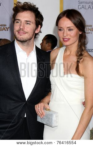 m LOS ANGELES - NOV 17:  Sam Claflin, Laura Haddock at the The Hunger Games: Mockingjay Part 1 Premiere at the Nokia Theater on November 17, 2014 in Los Angeles, CA