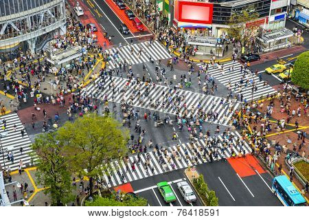 Tokyo, Japan view of Shibuya Crossing, one of the busiest crosswalks in the world.