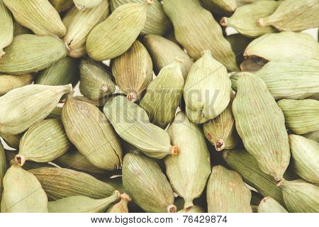 Green cardamom pods close-up. Macro photo