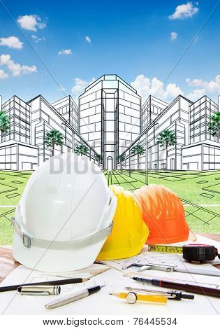 Architect Working Table With Writiing Tool  Safety Helmet And Perspective Plan Drawing Of New Buildi