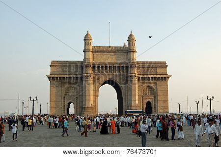 Pedestrians enjoying the evening at the Gateway to India Mumbai