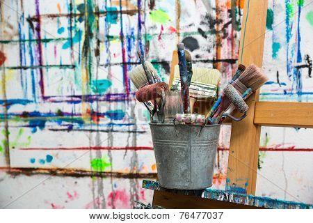 Painter's brushes in a bucket