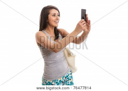 Young beautiful woman taking selfie