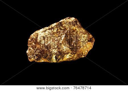 Gold Nugget On Black Background.