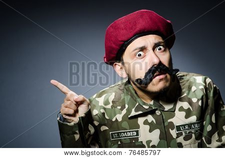Funny soldier in military concept