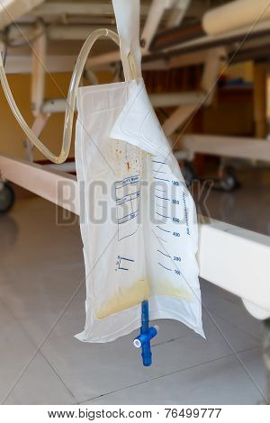 Plastic Urine Bag Hanging Under Patient Bed