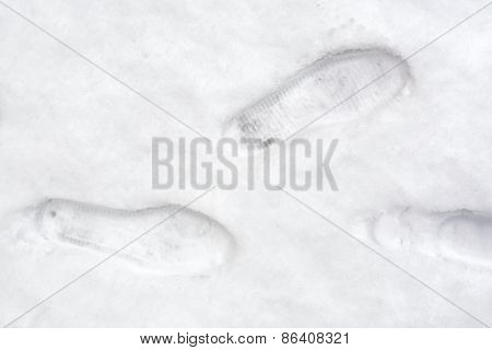 Tracks from boot a man in snow