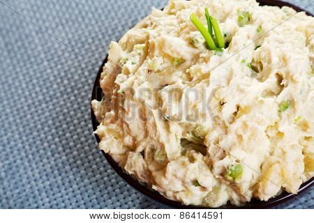 Patato And Avocado Mash Garnished With Mayonnaise