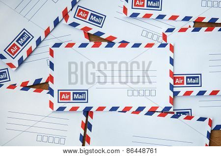 Envelope On Wooden Background