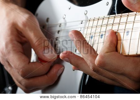 Hands Of Man Playing Electric Guitar Closeup