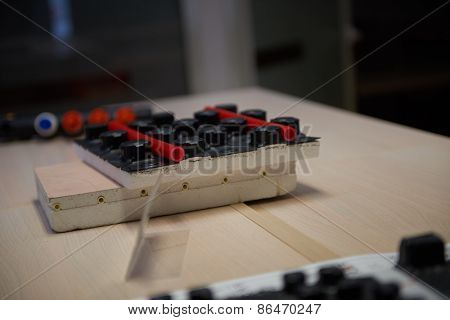 Black underfloor heating posed in a under construction building