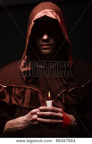 mysterious Catholic monk. studio shot