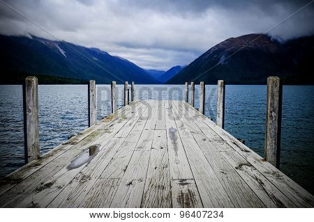 Pier Leading Into The Lake At Wairau, New Zealand