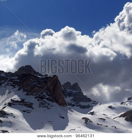 Snowy Mountains In Nice Day Before Storm