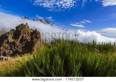 Hiking Pico do Arierio and Pico Ruivo - Madeira Portugal - travel background