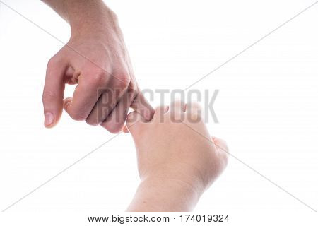 Friends Making A Pinkie Promise. Hands Isolated On White Backgro