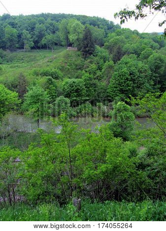 South Fork Dam and Lake Conemaugh where the Johnstown Flood started with Train Tracks beside the Conemaugh River