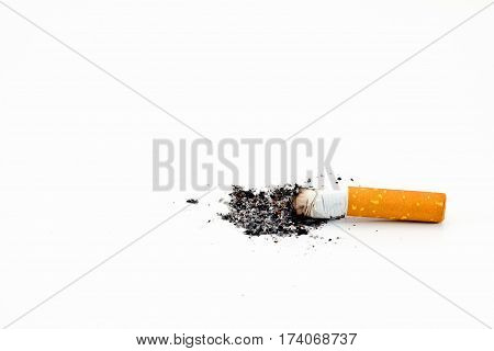 Single cigarette butt with ash isolated on white background