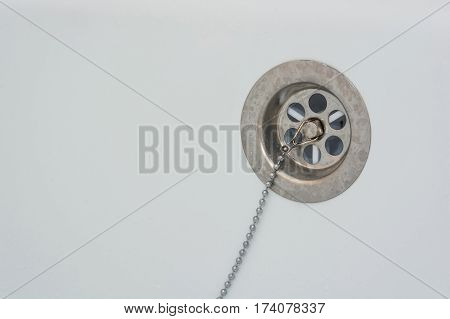 Overflow-prevention device with lead and chain in bathtub