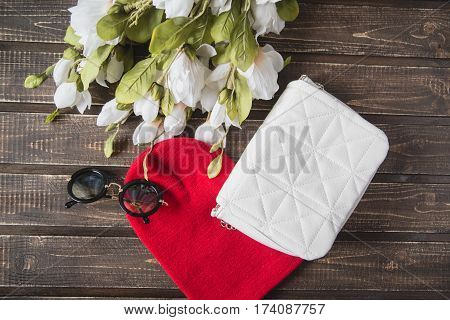 Bag and flowers isolated on the white background