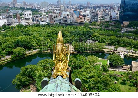 Golden Dragon Fish Statue Or Shachihoko At Roof Top And Aerial View Around Osaka Castle