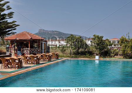 Camyuva Kemer Antalya Turkey - 29 august 2014: Swimming pool in the open air with a bar for hotel guests and a barbecue area.