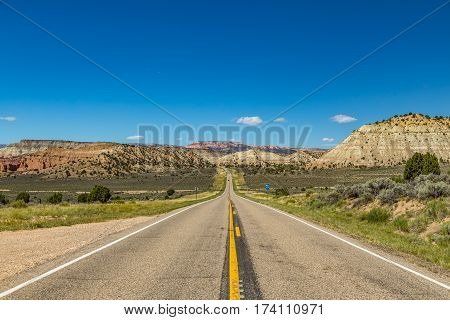 Highway 12 is one of the most scenic highways in America receiving the designation of 'All American Road' in 2002. The highway has two National Parks Bryce Canyon and Capitol Reef at each end and many other scenic points in between.