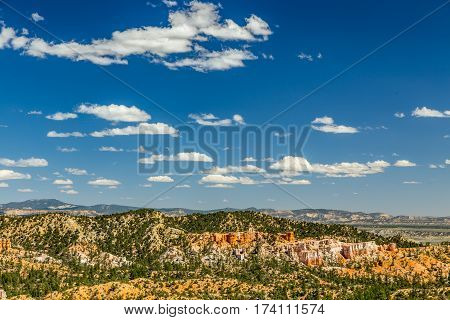 Bryce Canyon National Park a sprawling reserve in southern Utah is known for crimson-colored hoodoos which are spire-shaped rock formations.