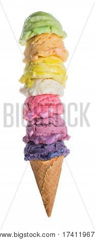 Stack of colourful ice cream scoops in a cone, isolated