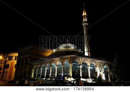 TIRANA, ALBANIA - SEPTEMBER 27: The Et'hem Bey Mosque at night on Skanderbeg Square, Tirana, Albania on September 27, 2016.