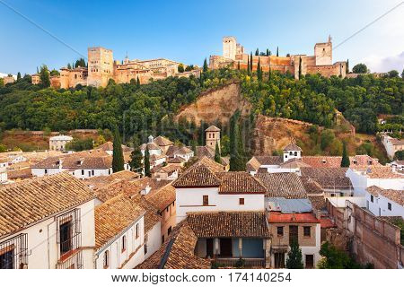 Palace and fortress complex Alhambra and old town area of Albaicin during sunset in Granada, Andalusia, Spain