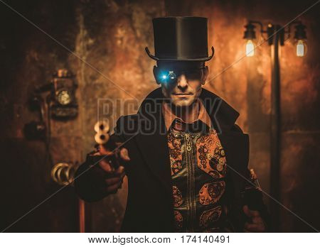 steampunk style man with various mechanical devices on vintage steampunk background