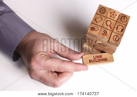 Business, Technology, Internet And Network Concept. Young Businessman Shows The Word: Link Building
