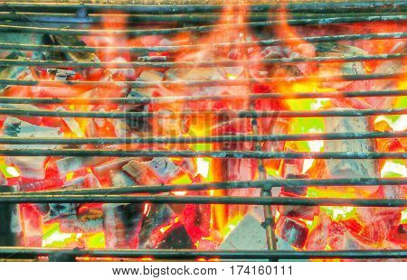 Unique colors of the flames from the sweltering heat of the grill.
