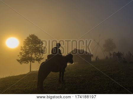 Tribe gathered in the morning at the mountains and beautiful sunlight on the hill.