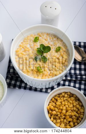 Dahi Bundi or Boondi Raita, favourite indian started or side dish made using Rajasthani snack food made from sweetened, fried chickpea flour, called Boondi with sweet and salty curd or buttermilk