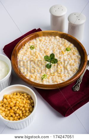 Dahi Bundi or Boondi Raita, favourite indian started or side dish made using Rajasthani snack food made from sweetened, fried chickpea flour, called Boondi with sweet and salty curd or buttermilk