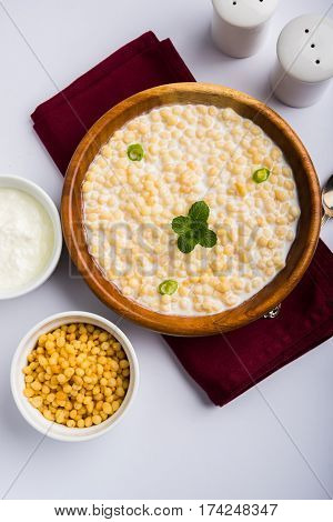 Dahi Bundi or Boondi Raita, favourite indian started or side dish made using Rajasthani snack food made from sweetened, fried chickpea flour, called Boondi with sweet and salty curd or buttermilk
