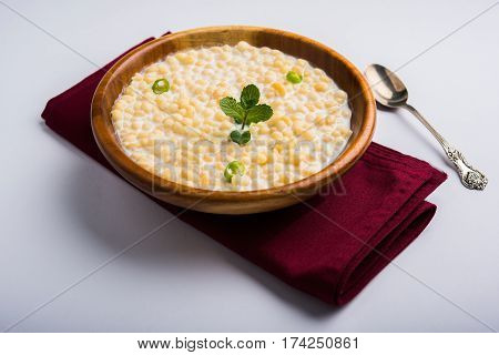 Dahi Bundi or Boondi Raita, favourite indian started or side dish made using Rajasthani snack food made from sweetened, fried chickpea flour, called Boondi with sweet and salty curd or buttermilk