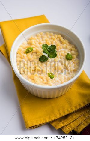 Dahi Bundi or Boondi Raita, favourite indian started or side dish made using Rajasthani snack food made from sweetened, fried chickpea flour, called Boondi with sweet and salty curd or buttermilk