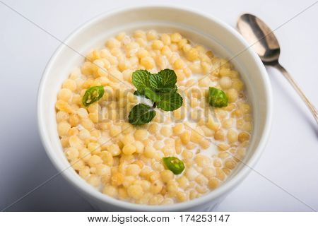 Dahi Bundi or Boondi Raita, favourite indian started or side dish made using Rajasthani snack food made from sweetened, fried chickpea flour, called Boondi with sweet and salty curd or buttermilk