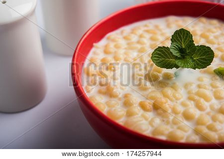Dahi Bundi or Boondi Raita, favourite indian started or side dish made using Rajasthani snack food made from sweetened, fried chickpea flour, called Boondi with sweet and salty curd or buttermilk