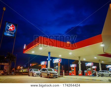 Kedah, Malaysia - February 27, 2017: Caltex gas station blue sky background during sunset. Caltex is a petroleum brand name of Chevron Corporation used in more than 60 countries.