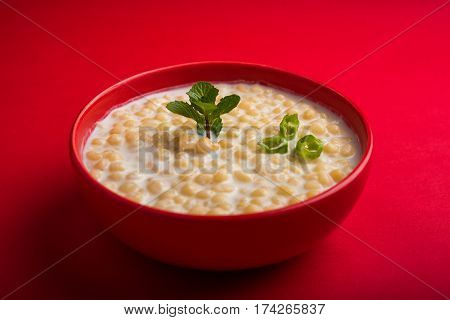 Dahi Bundi or Boondi Raita, favourite indian started or side dish made using Rajasthani snack food made from sweetened, fried chickpea flour, called Boondi with sweet and salty curd or buttermilk