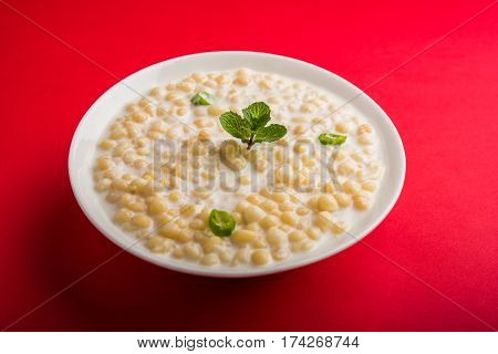 Dahi Bundi or Boondi Raita, favourite indian started or side dish made using Rajasthani snack food made from sweetened, fried chickpea flour, called Boondi with sweet and salty curd or buttermilk