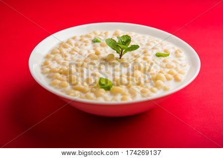 Dahi Bundi or Boondi Raita, favourite indian started or side dish made using Rajasthani snack food made from sweetened, fried chickpea flour, called Boondi with sweet and salty curd or buttermilk