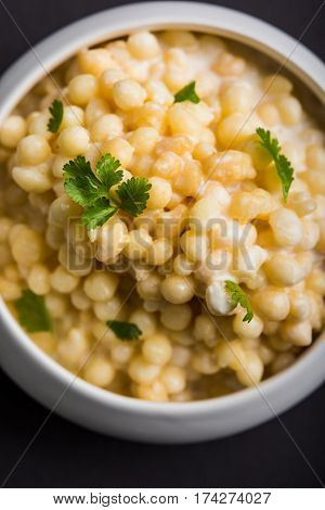 Dahi Bundi or Boondi Raita, favourite indian started or side dish made using Rajasthani snack food made from sweetened, fried chickpea flour, called Boondi with sweet and salty curd or buttermilk