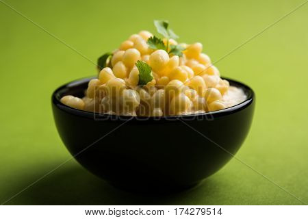 Dahi Bundi or Boondi Raita, favourite indian started or side dish made using Rajasthani snack food made from sweetened, fried chickpea flour, called Boondi with sweet and salty curd or buttermilk